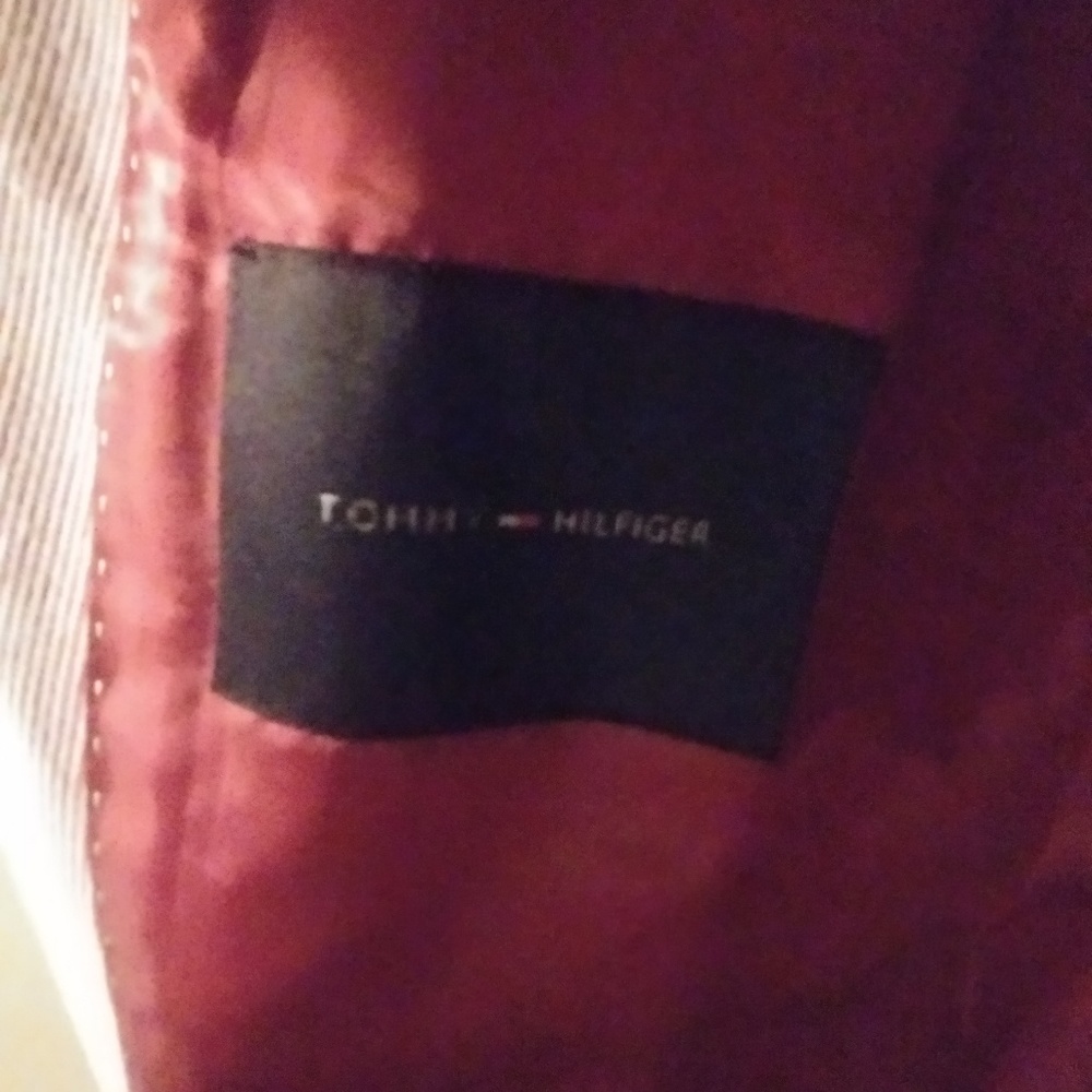 A Tommy Hilfiger red stripes and white jacket
